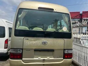 Toyota Coaster 2012 Gold