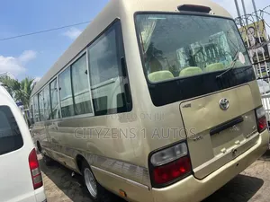 Toyota Coaster 2012 Gold