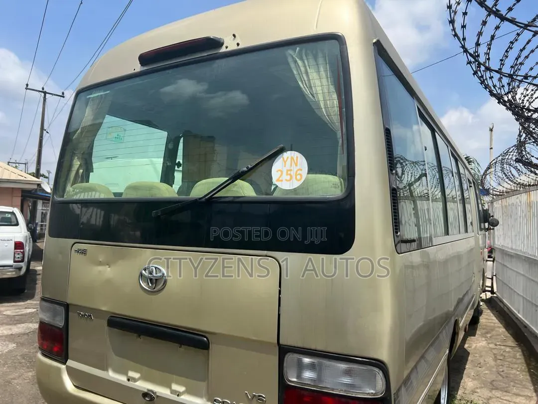 Toyota Coaster 2012 Gold