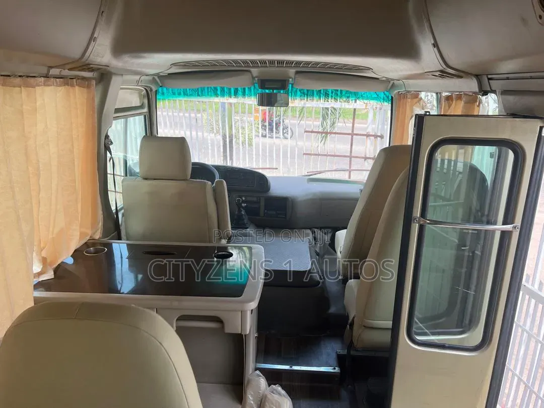 Toyota Coaster 2012 Gold