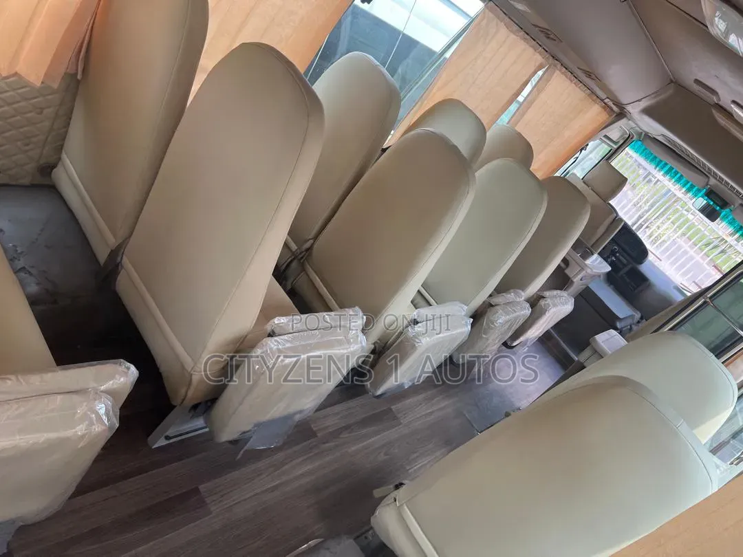 Toyota Coaster 2012 Gold
