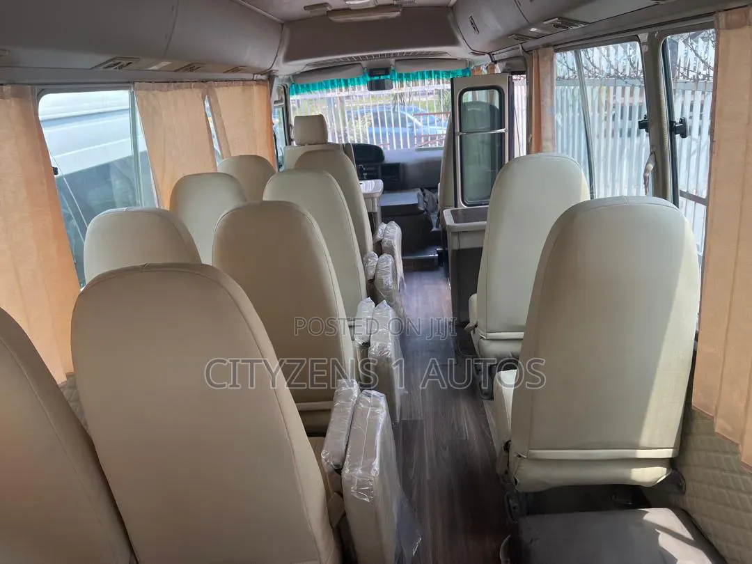 Toyota Coaster 2012 Gold