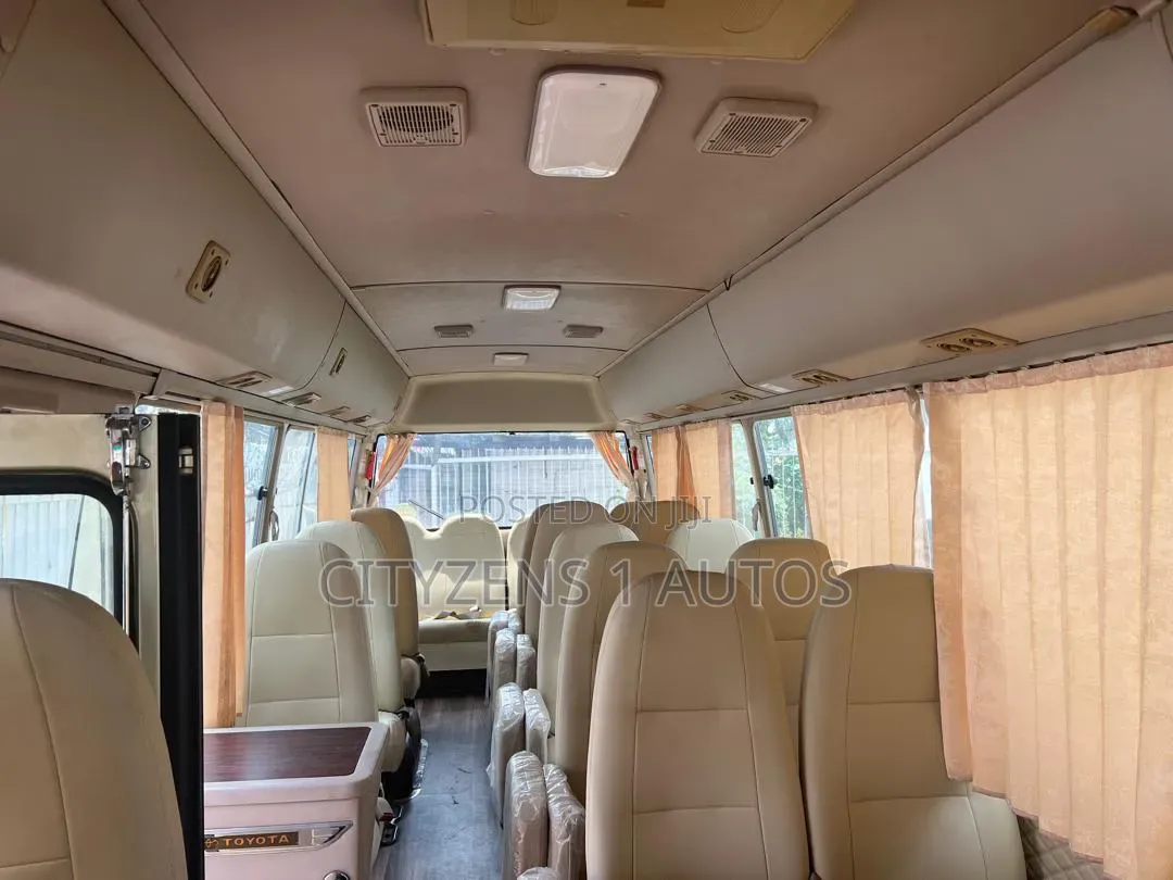 Toyota Coaster 2012 Gold