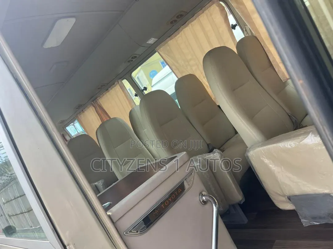 Toyota Coaster 2012 Gold