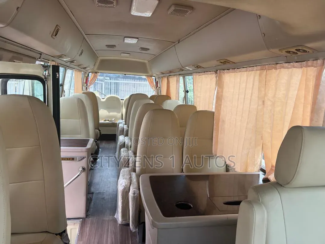Toyota Coaster 2012 Gold
