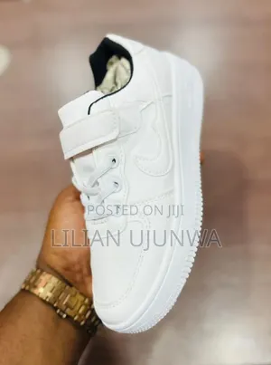 White Kiddies Sneakers. Size 34 36 Available