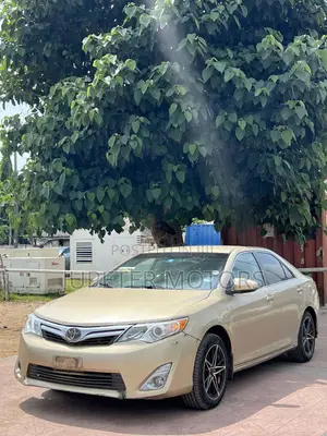 Toyota Camry LE 4dr Sedan (2.5L 4cyl 6A) 2013 Gold