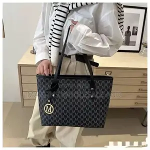Black-and-Grey Monogram Tote Bag Featuring an "M" Letter Pattern
