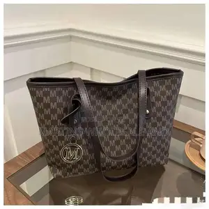 Black-and-Grey Monogram Tote Bag Featuring an "M" Letter Pattern