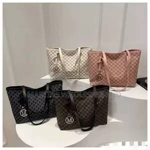 Black-and-Grey Monogram Tote Bag Featuring an "M" Letter Pattern