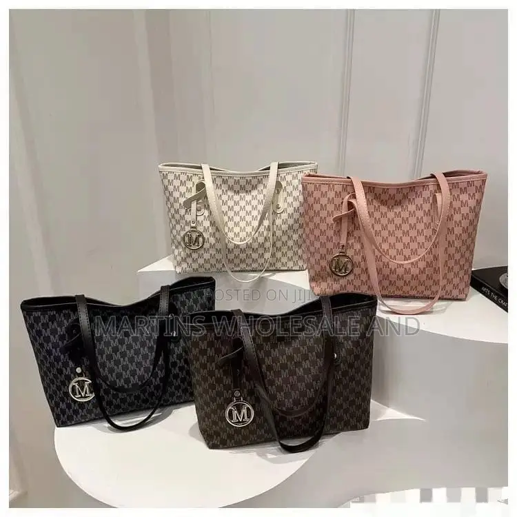 Black-and-Grey Monogram Tote Bag Featuring an "M" Letter Pattern