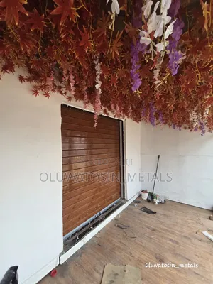 Premium Galvanized Roller Shutter Door – Wood Colour Design