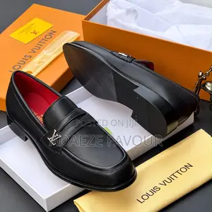 Men’s Black Louis Vuitton Leather Loafers With Silver LV Logo