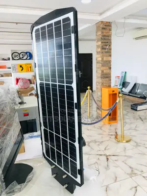 Four-Lens Solar Security Device With Integrated Street Illumination