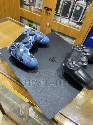 Uk Clean Used Ps4 Console (With Two Pads)
