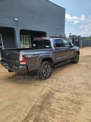 Toyota Tacoma 4dr Access Cab 4WD 6.1 ft. SB (2.7L 4cyl 4A) 2015 Gray