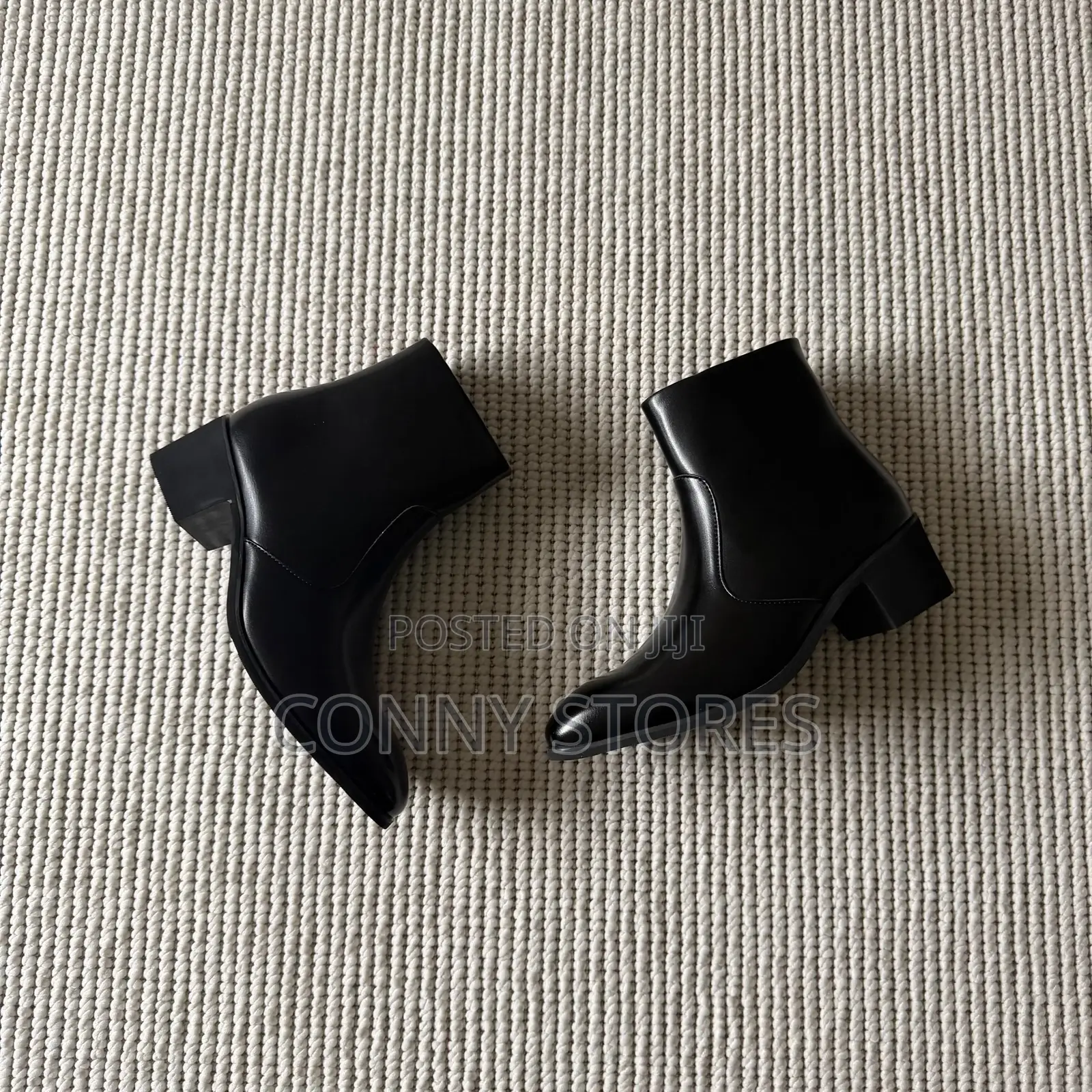 The Heeled Leather Ankle Boot in Black