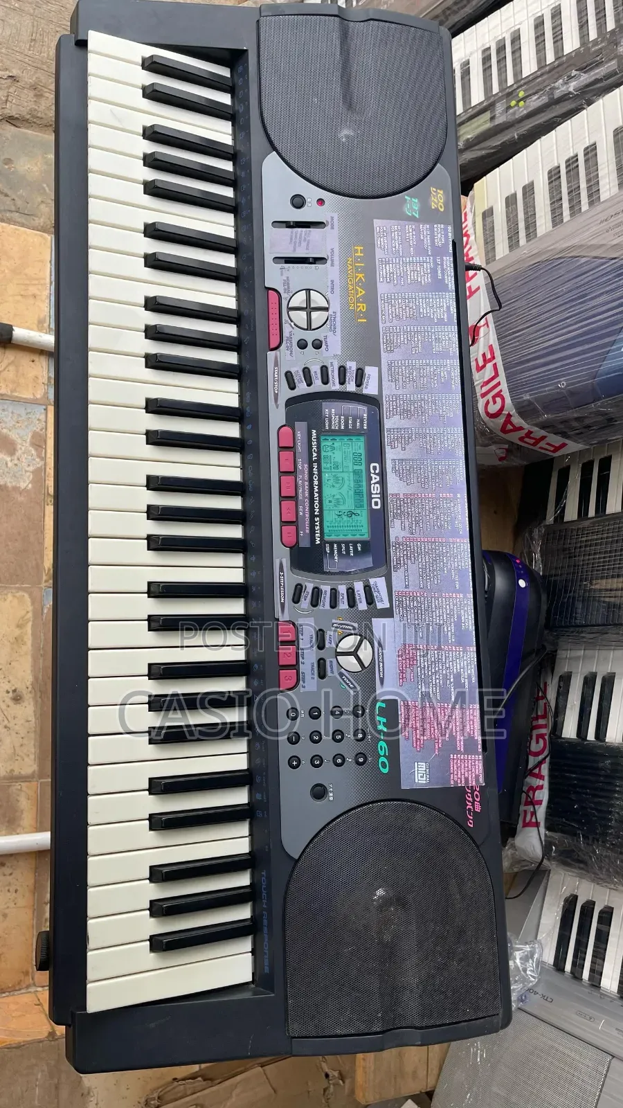 5-Octave Premium Casio CTK-660L Keyboard Piano Wit Transpose & Adapter