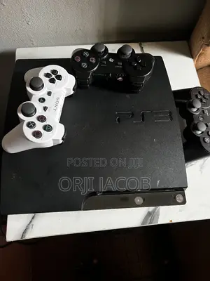 Hacked Ps3 Slim With 3 Controllers and 5 Games