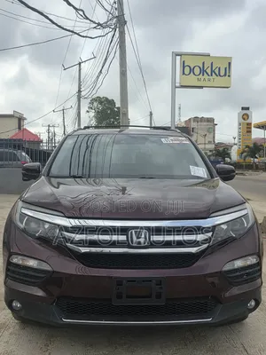 Honda Pilot Touring 4dr SUV 4WD (3.5L 6cyl 9A) 2017 Burgundy
