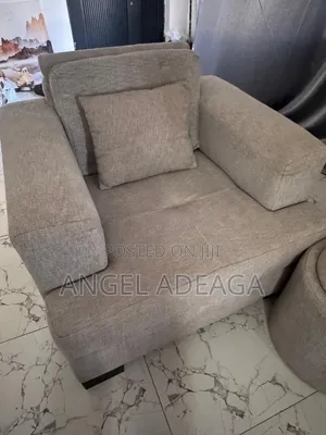 7 Sitting L Shaped Sofa and Ottomans