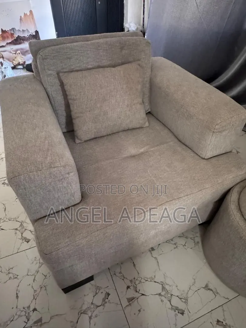 7 Sitting L Shaped Sofa and Ottomans
