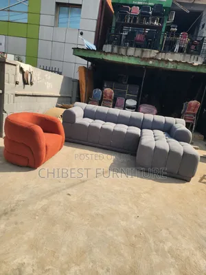 Neatly Padded L-Shaped Sofa Couch.