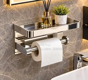 Wall-Mounted Toilet Paper Holder With a Storage Shelf.