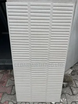 Wood-Effect Tiles for Luxury Design ( Lighter Shade ).
