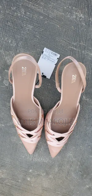 Nude Ish Pink Heel Pumps With Criss-Cross Design
