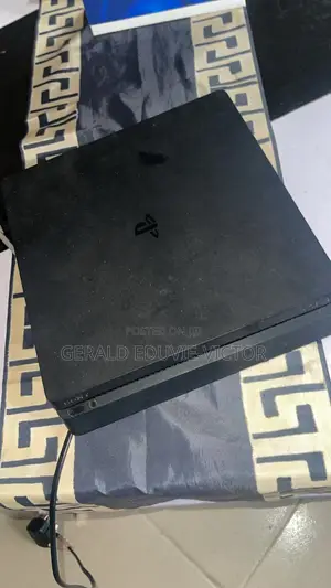 UK Used PS4 Slim + One Controller With 1Terabyte Storage.