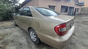Toyota Camry LE 4dr Sedan (2.4L 4cyl 4A) 2004 Gold