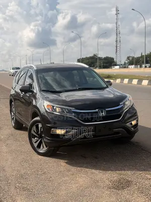 Honda CR-V Touring 4dr SUV AWD (2.4L 4cyl CVT) 2015