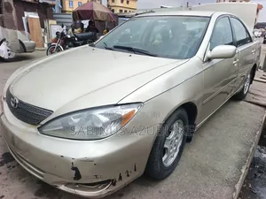 Toyota Camry LE V6 4dr Sedan (3.0L 6cyl 4A) 2003 Gold