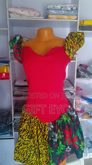 Elegant Red and Ankara Combination Gown With Stylish Puff Hand Lady