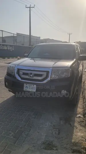 Honda Pilot Touring w/RES/Navi 4WD (3.5L 6cyl 5A) 2010 Black