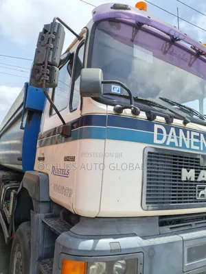 Man 10tyers Tipper With Front and Back Auxiliary