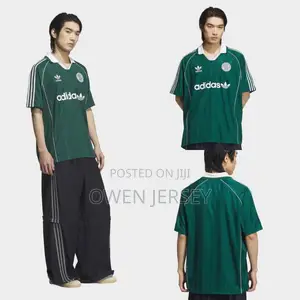 Adidas Dark Green Retro Football Jersey – Classic Trefoil Edition.