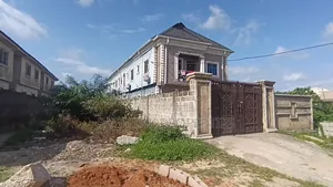 Half Plot of Land in an Estate