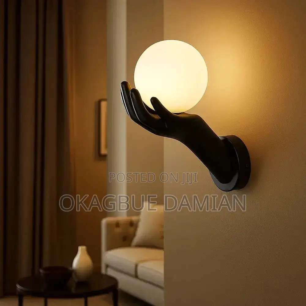 Hand-Shaped Wall Sconce With Globe Bulb