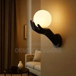 Hand-Shaped Wall Sconce With Globe Bulb
