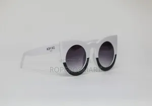 Ropero by LC White Oversized Round Sunglasses.