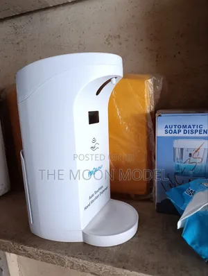 Universal Sanitizer Dispenser