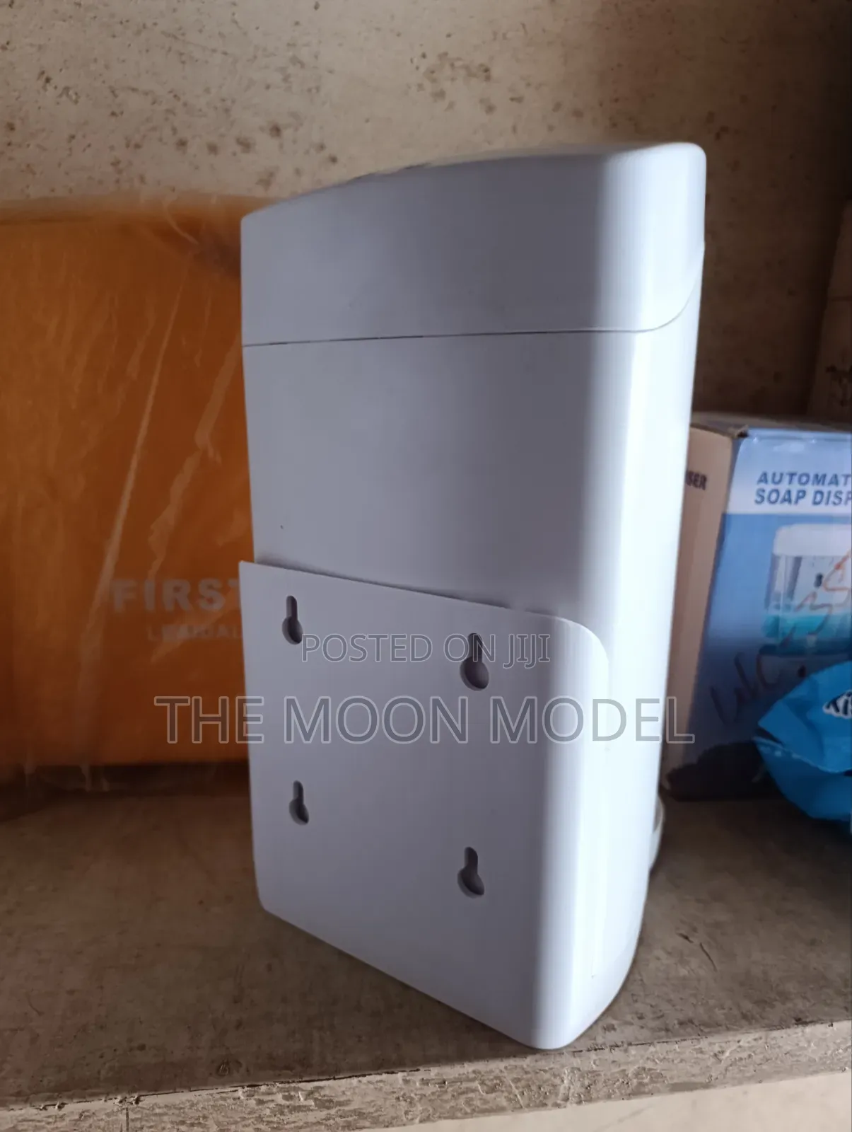 Universal Sanitizer Dispenser