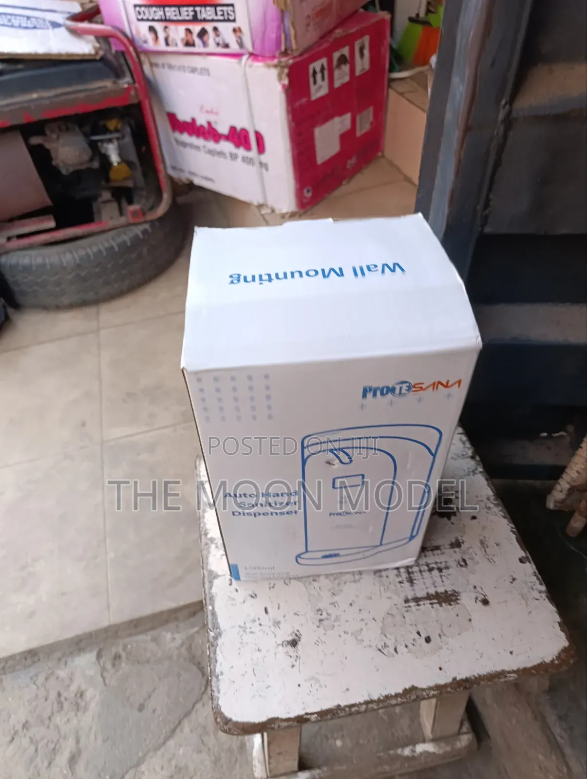 Universal Sanitizer Dispenser