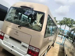 Toyota Coaster 2015 Gold