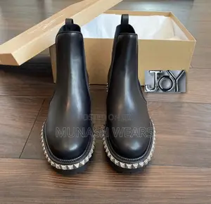 Christian Loubotin Leather Boot