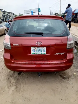Toyota Matrix Hatchback FWD (1.8L 4cyl 5M) 2006 Red