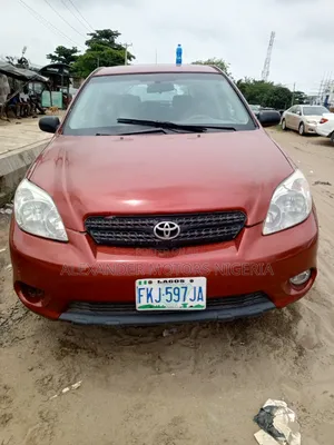 Toyota Matrix Hatchback FWD (1.8L 4cyl 5M) 2006 Red