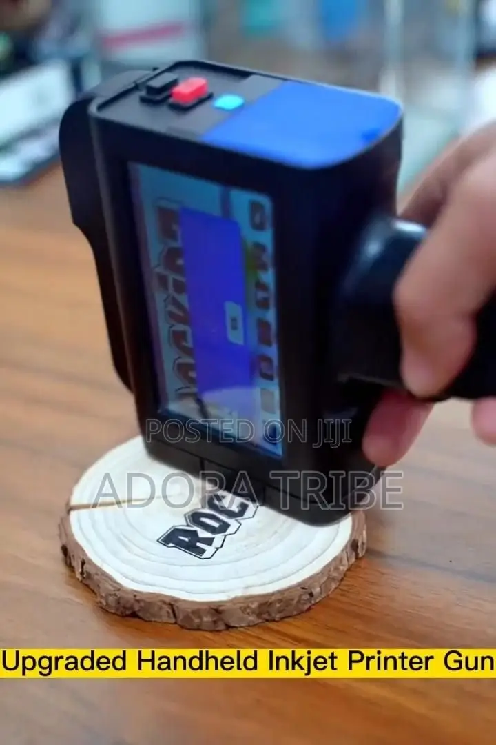 Hand-Held Ink Jet Printer